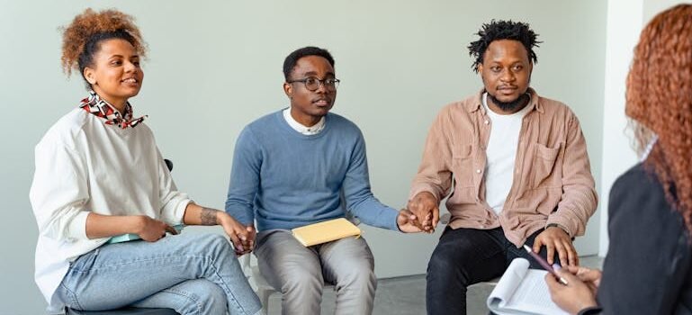 a therapist explaining the relationship between alcoholism and narcissism in a group therapy