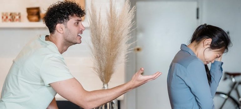 Couple fighting about excessive alcohol use.