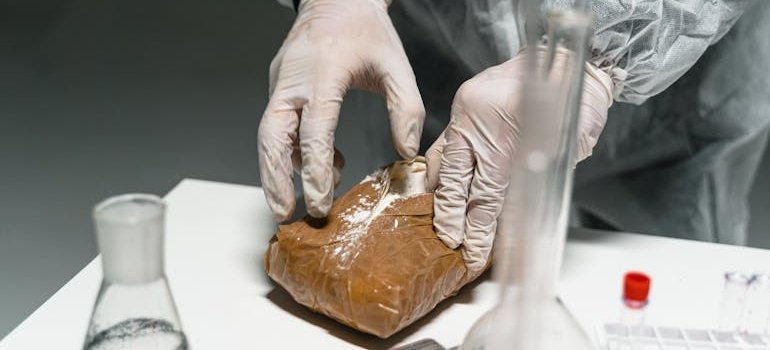 An image of a pharmacist testing drugs