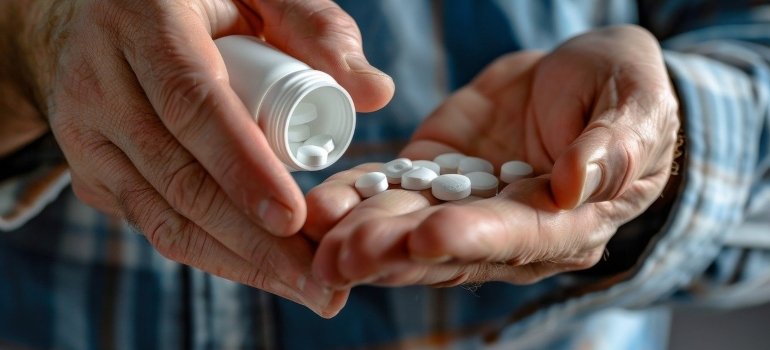 a man taking a medicine, struggling with Soma addiction 