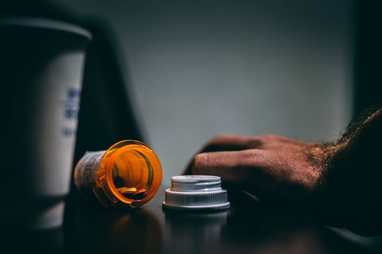 orange and white prescription bottle as a symbol of benzo withdrawal symptoms