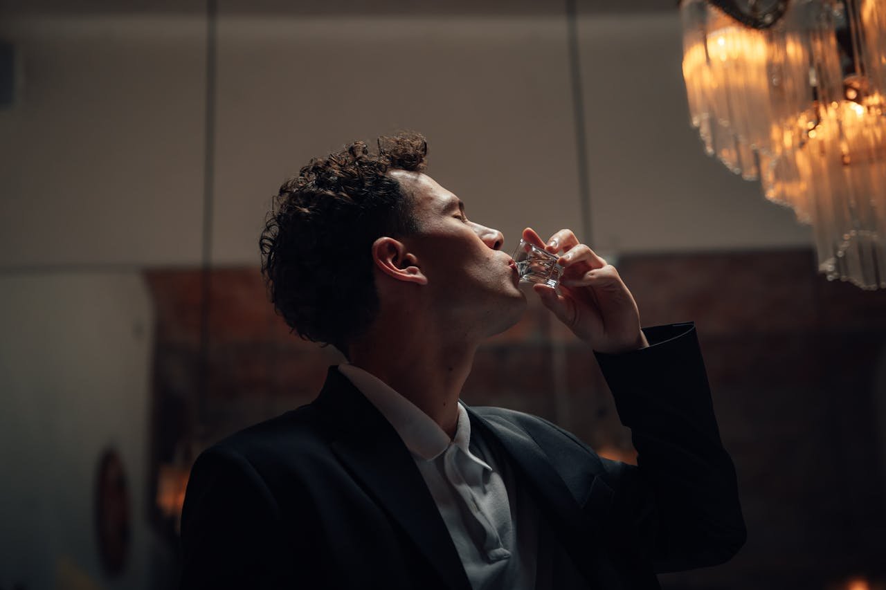 A man drinking because of alcohol abuse and mental health disorder