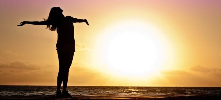 Woman silhouette during golden hour.