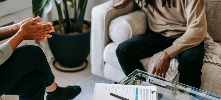 Man talking about Restoril and Melatonin dependency to her therapist.