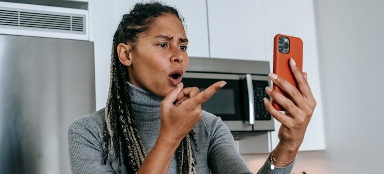 Woman fighting with someone over the phone.