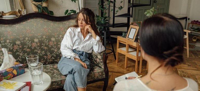 Woman talking about setbacks in recovery with her therapist.