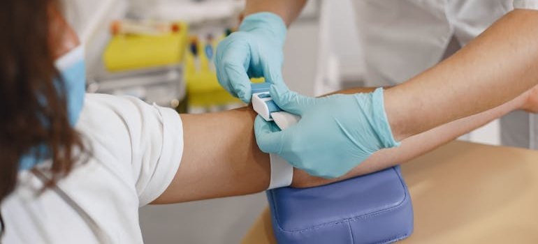 Woman getting her blood drawn.