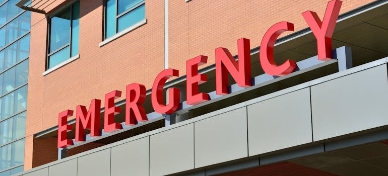 Emergency sign in front of a hospital.