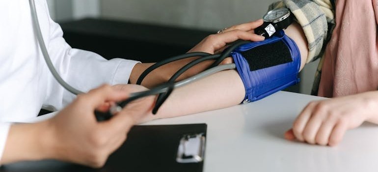 Person getting their blood pressure checked.