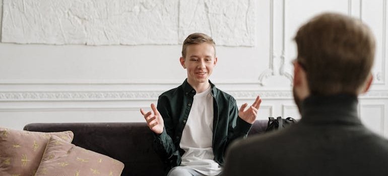 Young man talking about drugs and personality types with his therapist.