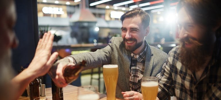 Person refusing an alcoholic drink.