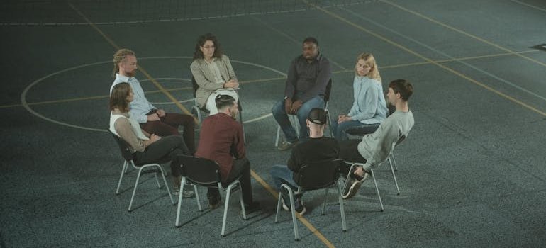 People in a support group talking about the opioid crisis and their experiences with it.