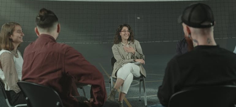 People talking in a support group.