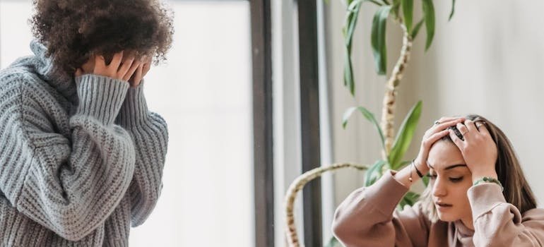 Two women having a conflict.