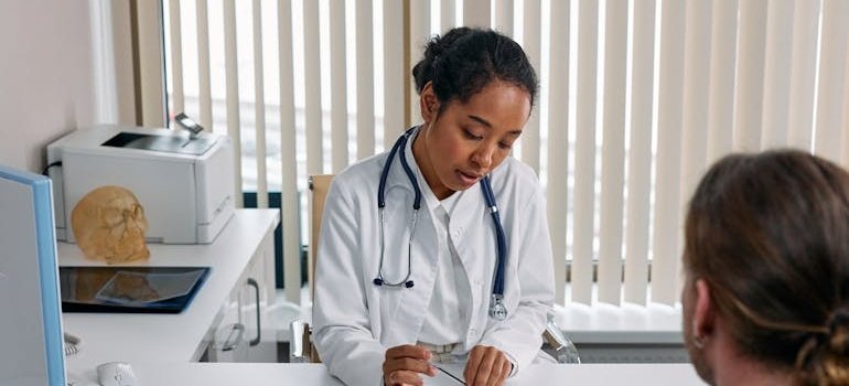 Doctor explaining the differences between buprenorphine vs Suboxone to her patient.