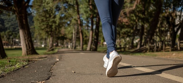Person having a walk in the park.