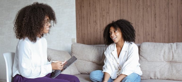 Woman talking about her dilemma about buprenorphine vs Suboxone with her therapist.