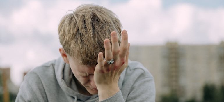 Man experiencing facial pain.