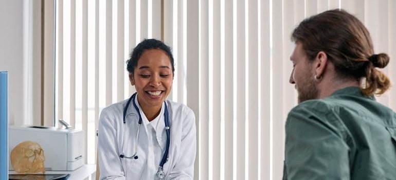 Doctor explaining are muscle relaxers addictive to a patient.