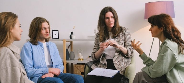 Support group talking about grief and substance abuse.