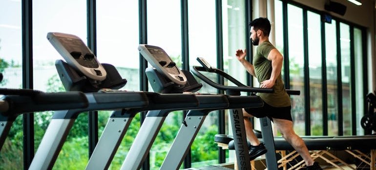Man running on a treadmill.