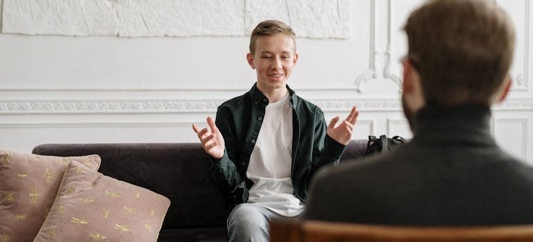 Therapist talking about how to practice mindfulness with his client.