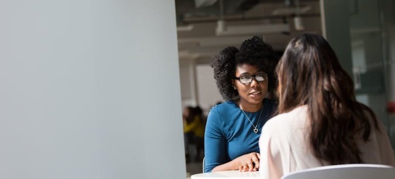 Two women having a conversation.