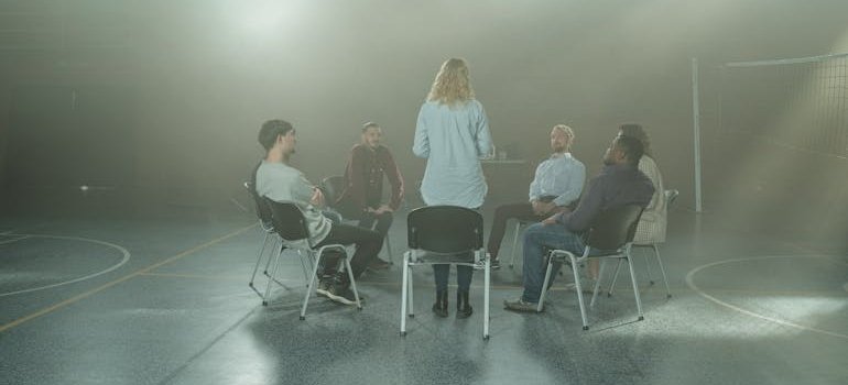 People discussing their issues in a support group.