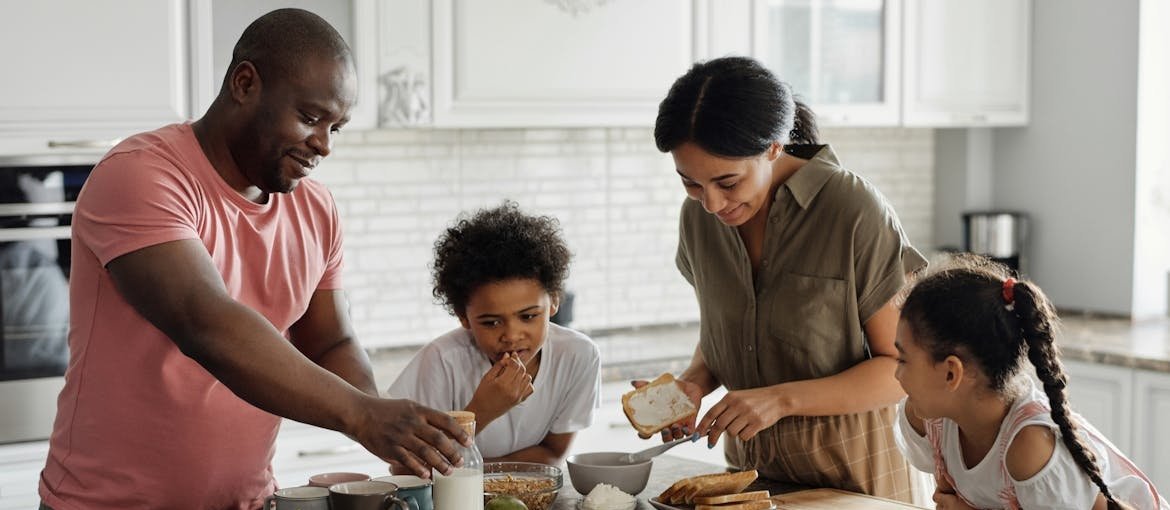 Family having breakfast together.