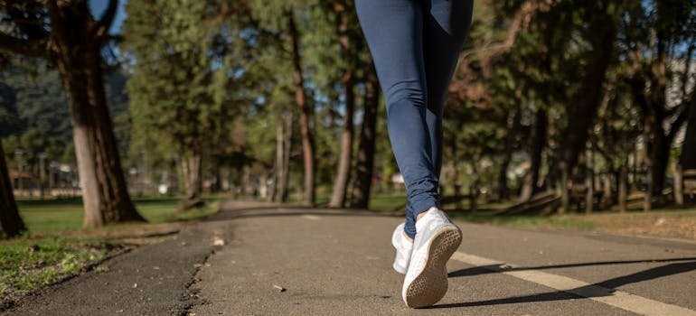 Woman taking a walk in the park.