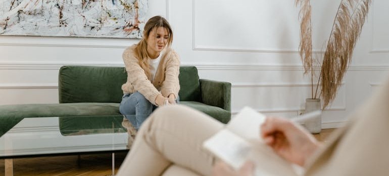 Therapist explaining principles of CBT to a patient.