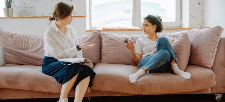 Woman talking about is Tramadol addictive with her therapist.