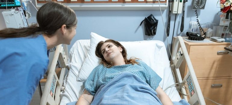 Nurse checking on a patient who is on delirium tremens medications.