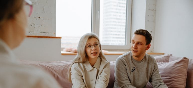 Couple talking about their problems with toxic behavior with their therapist.