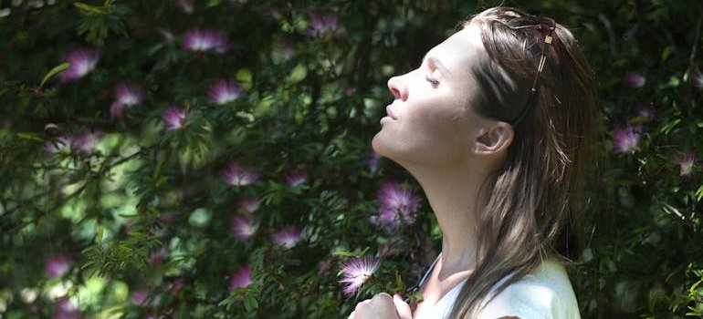 Woman doing breathing exercises.