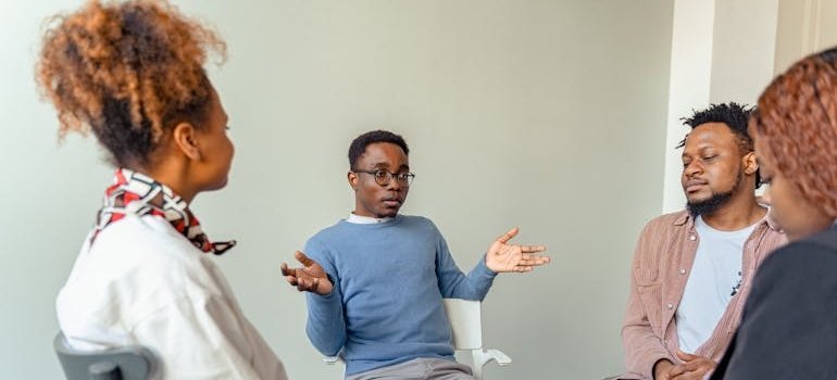 People discussing their issues in peer led mental health support groups.