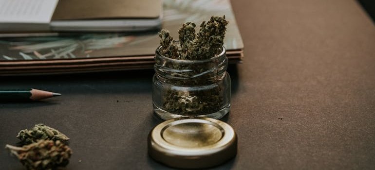 Marijuana in a glass jar.