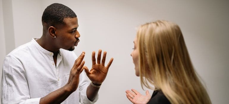 Man trying to calm down his partner.