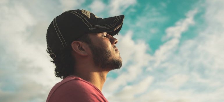 Man practicing grounding breath techniques.