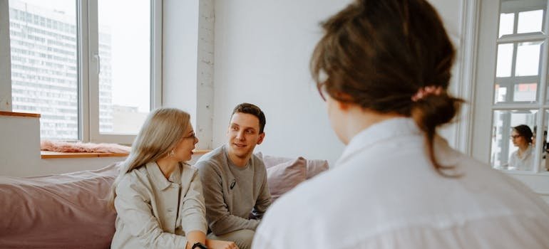 Couple talking to each other in family therapy.